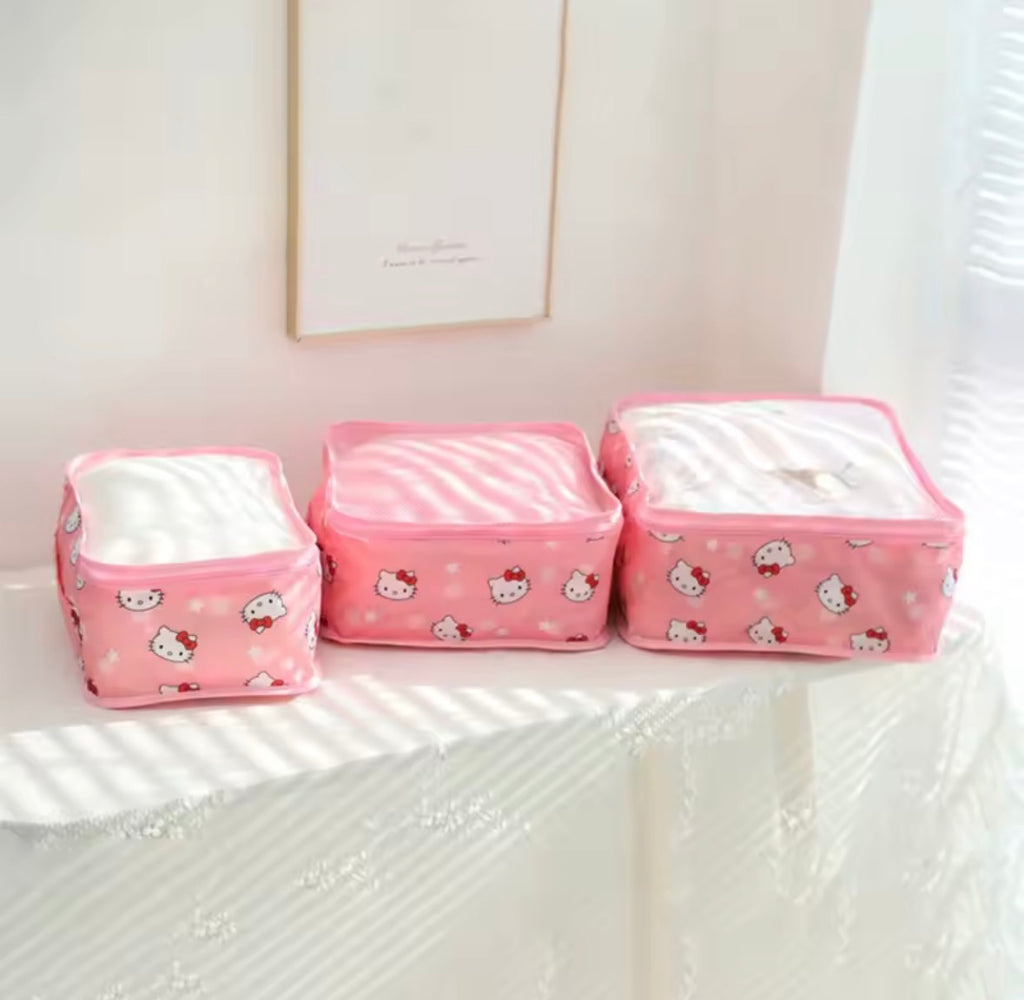 Hello Kitty 6-piece packing cube set in pink laid out flat