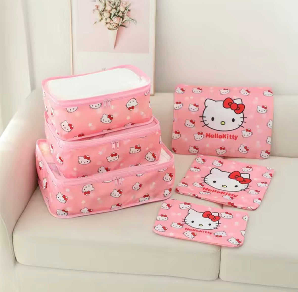 Close up of Hello Kitty character print on pink luggage organizer fabric